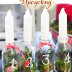 Upcycling-Adventskranz aus Glasflaschen und Naturmaterial